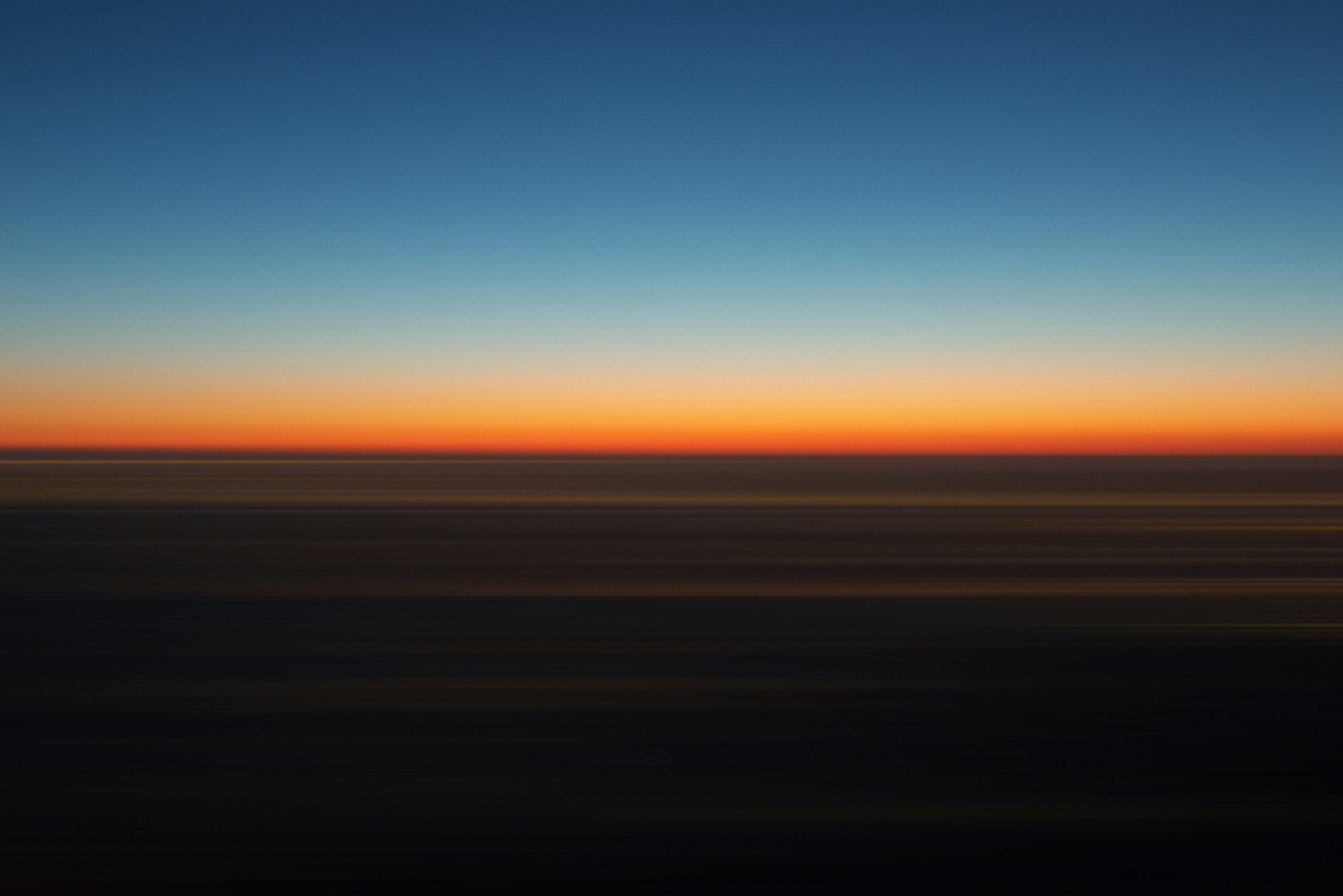 blue and orange sky during sunset